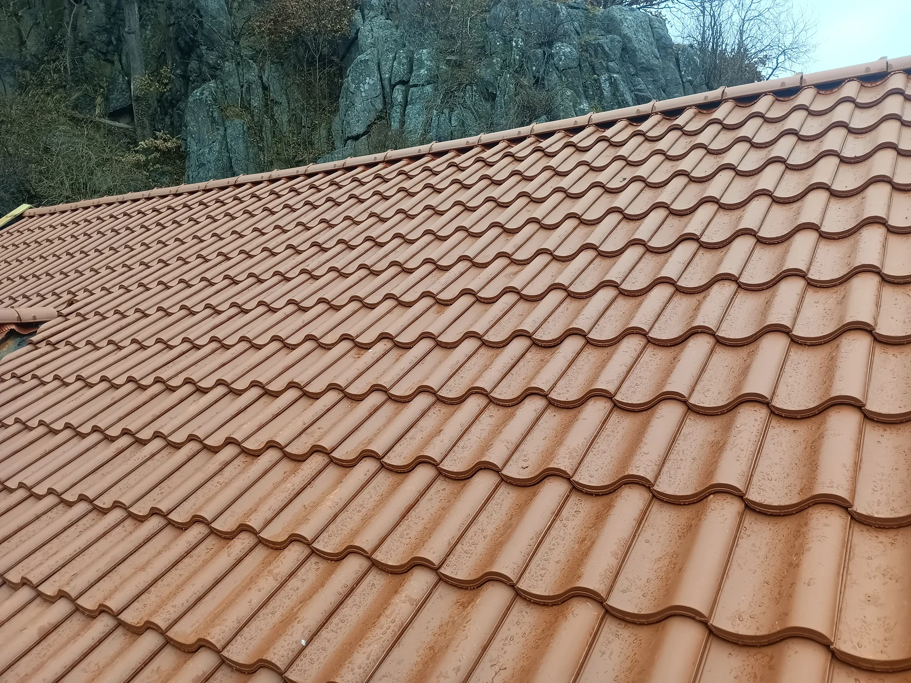 Red clay tile roof installation project