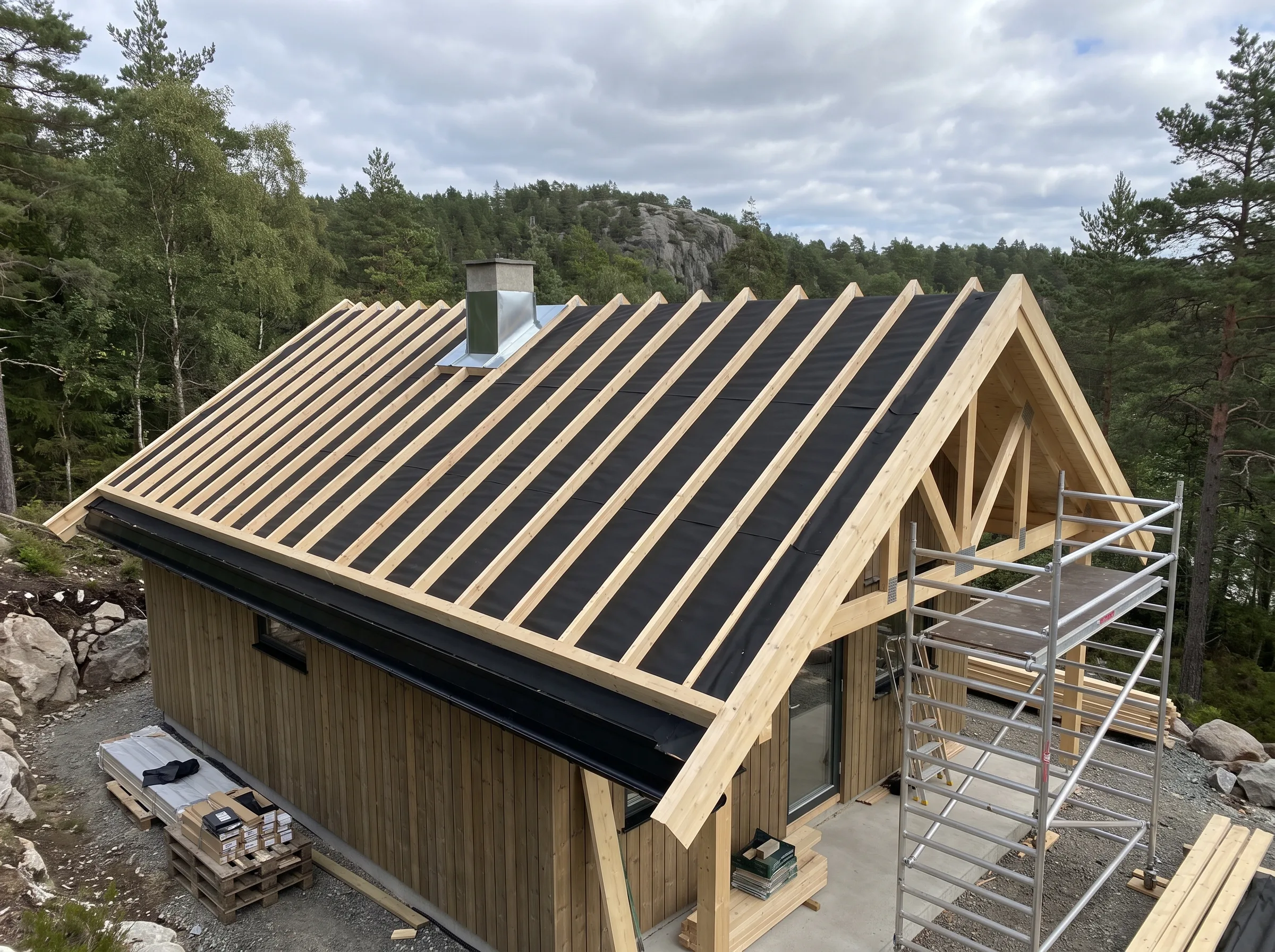 Nytt tak med takrenner og takvindu installert